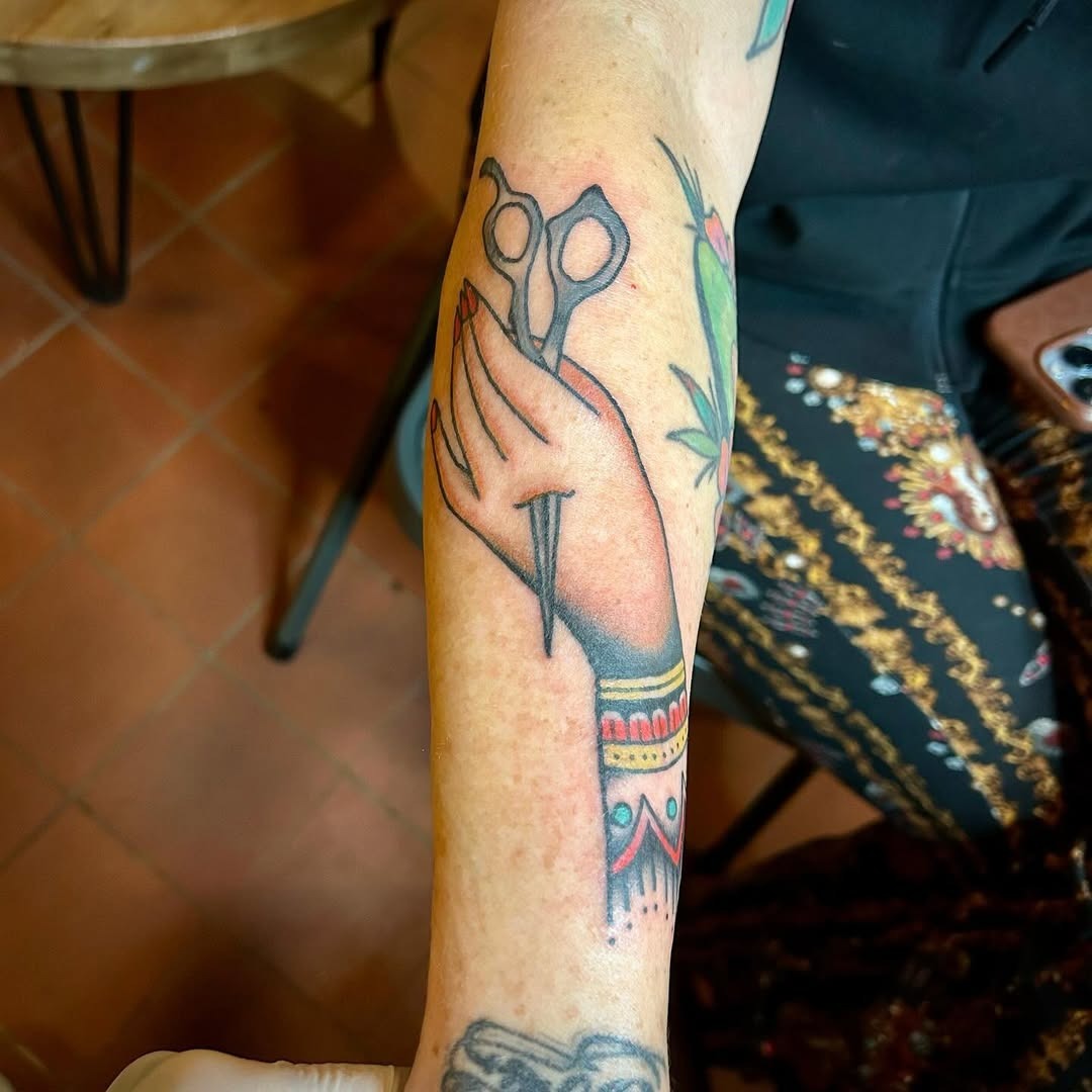 Stylish tattoo showcasing scissors and artistry Tattoo Design