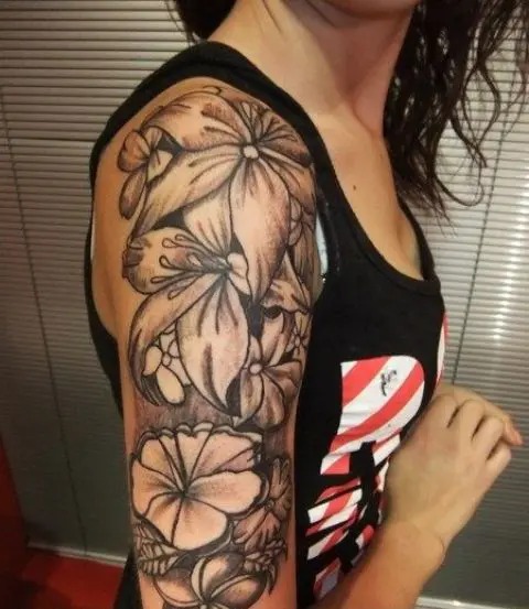 Bold Floral Upper Arm Sleeve Tattoo Design
