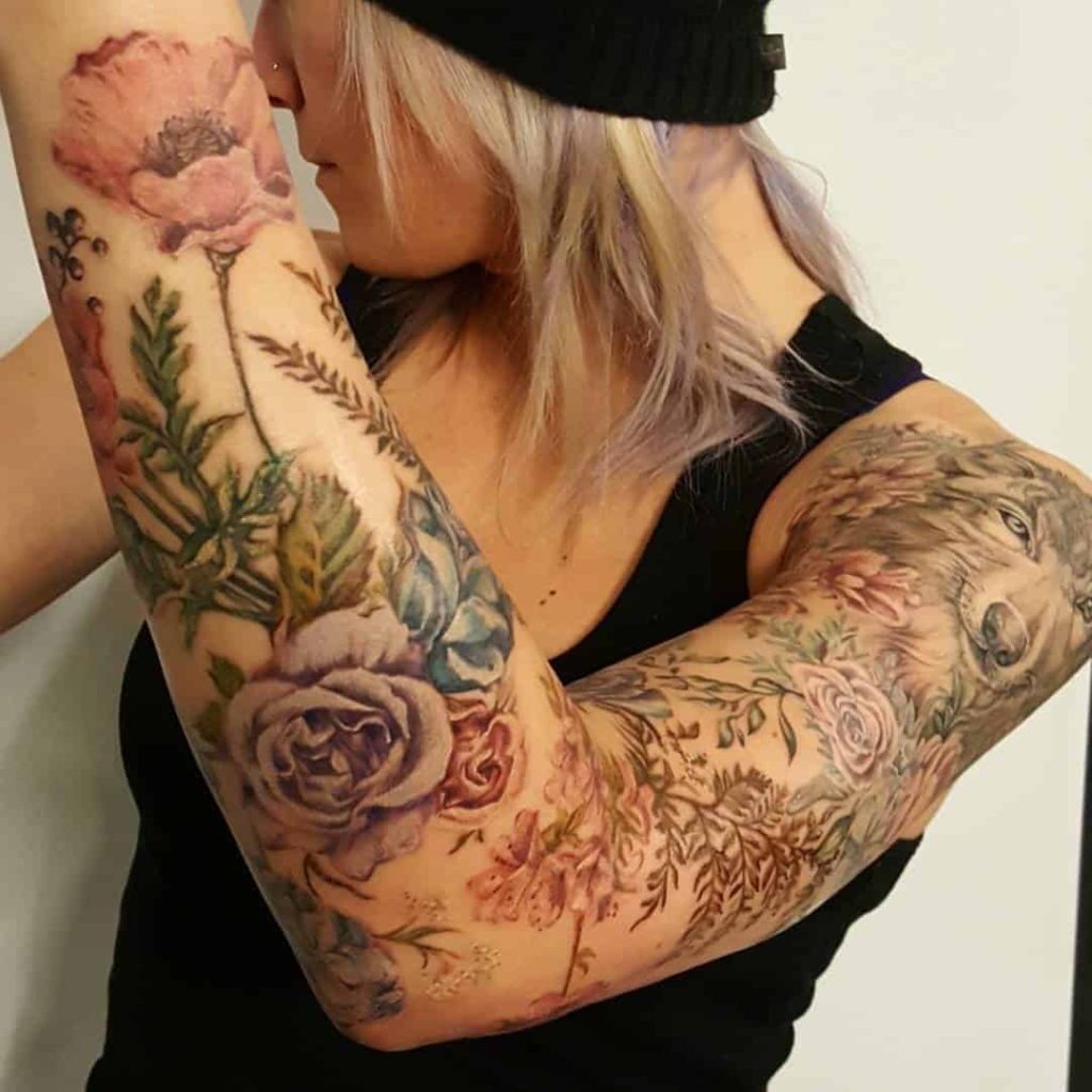 Colorful Floral Sleeve with a Touch of Nature Tattoo Design