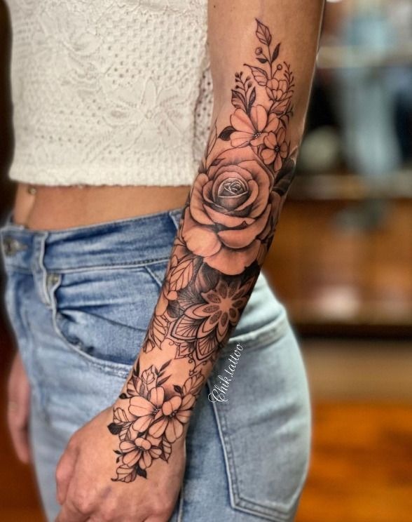 Floral Fullness on the Lower Arm Tattoo Design