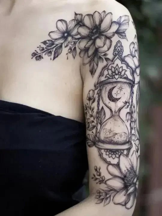Hourglass and Floral Timepiece Tattoo Design