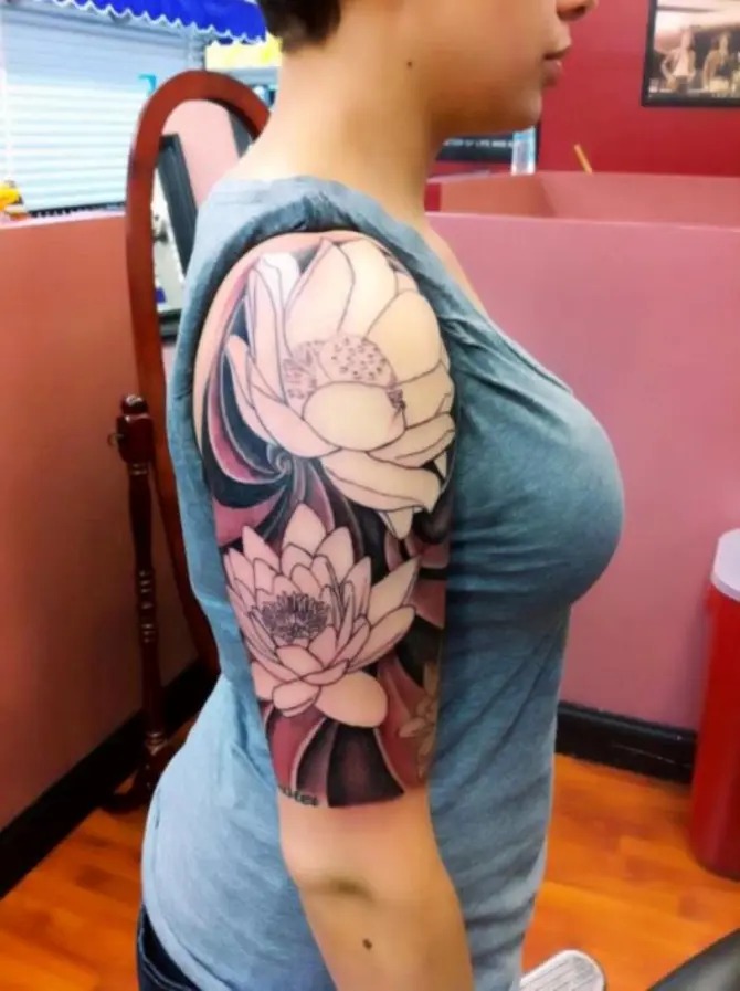 Lotus Blossom with Bold Black Contrast Tattoo Design