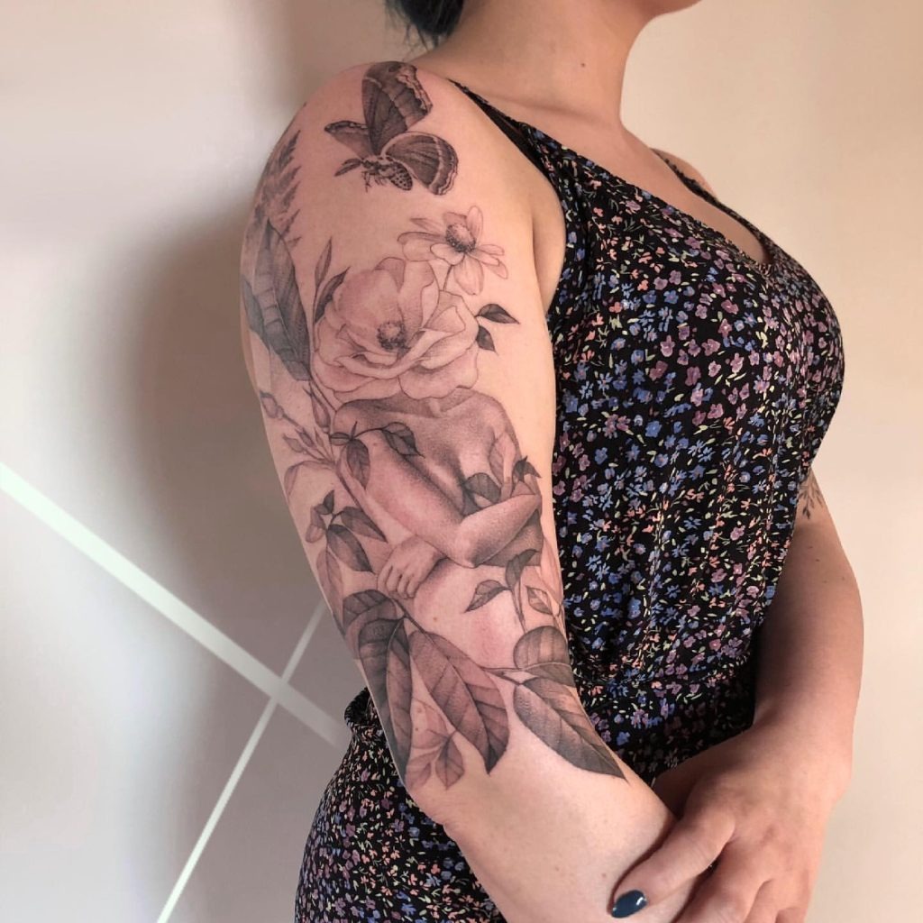 Roses, Butterflies, and Feminine Elegance Tattoo Design