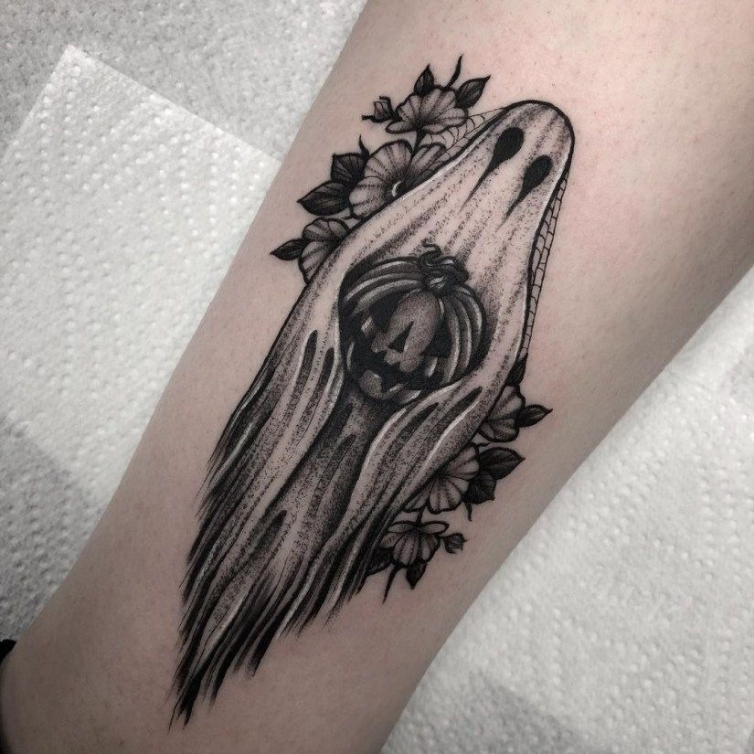 Flowing Ghost with Pumpkin, a tattoo design rendered in clean detailed linework.