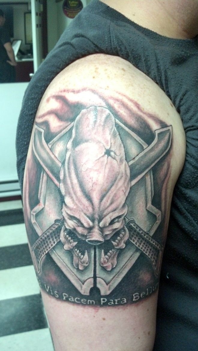 Fierce Elite Shoulder Emblem Tattoo Design