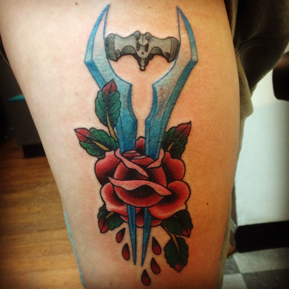 Rose and Energy Blade Halo Tattoo Tattoo Design