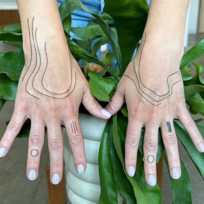 Abstract Line Hand Tattoos with Minimalist Symbols Tattoo Design