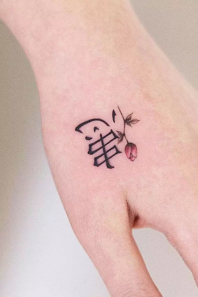 Asian Symbol and Flower Hand Tattoo Design Tattoo Design