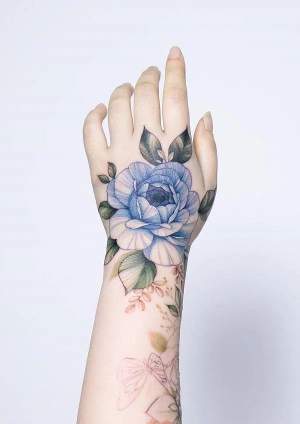 Blue Rose Hand Tattoo with Realistic Shading Tattoo Design