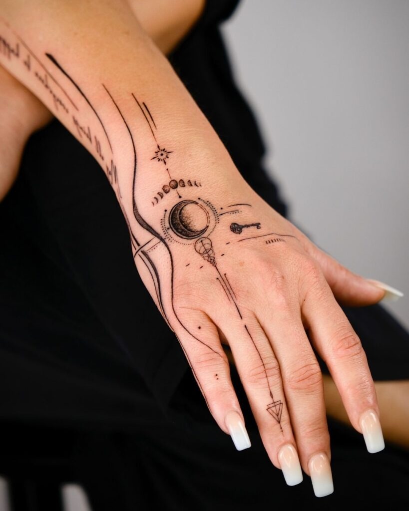Cosmic Key and Moon Hand Tattoo Design Tattoo Design