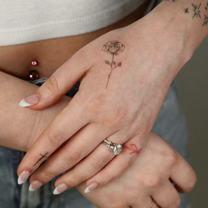 Delicate Rose and Cross Hand Tattoos Tattoo Design