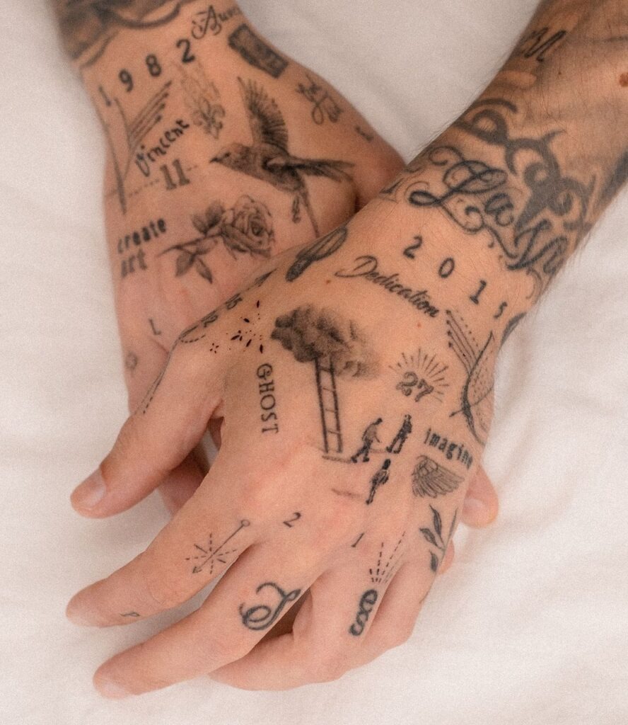 Eclectic Symbolic Hand Tattoo Design Tattoo Design