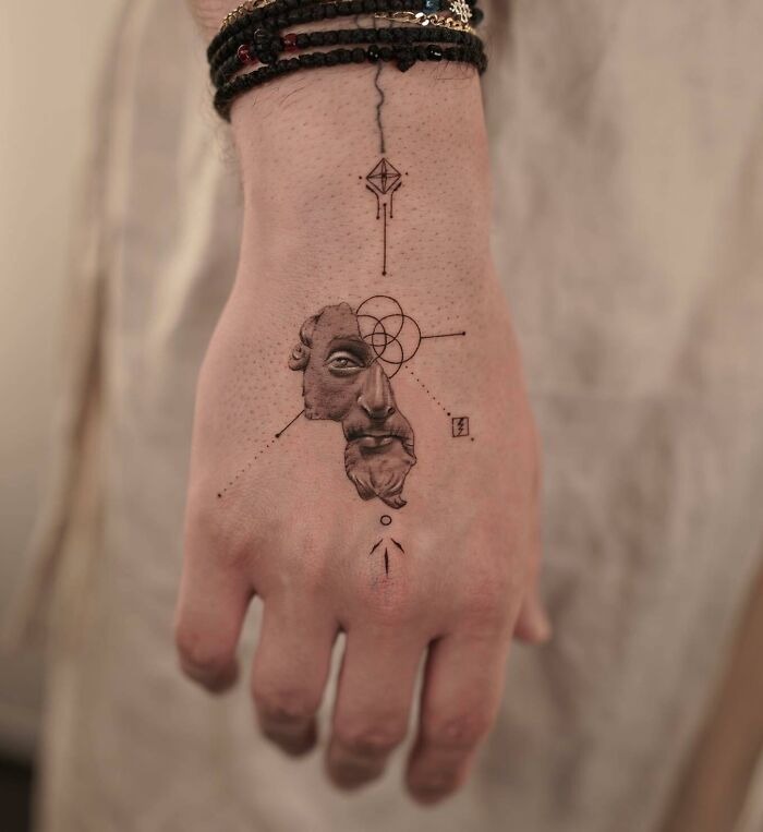 Geometric Abstract Hand Tattoo with Face Design Tattoo Design