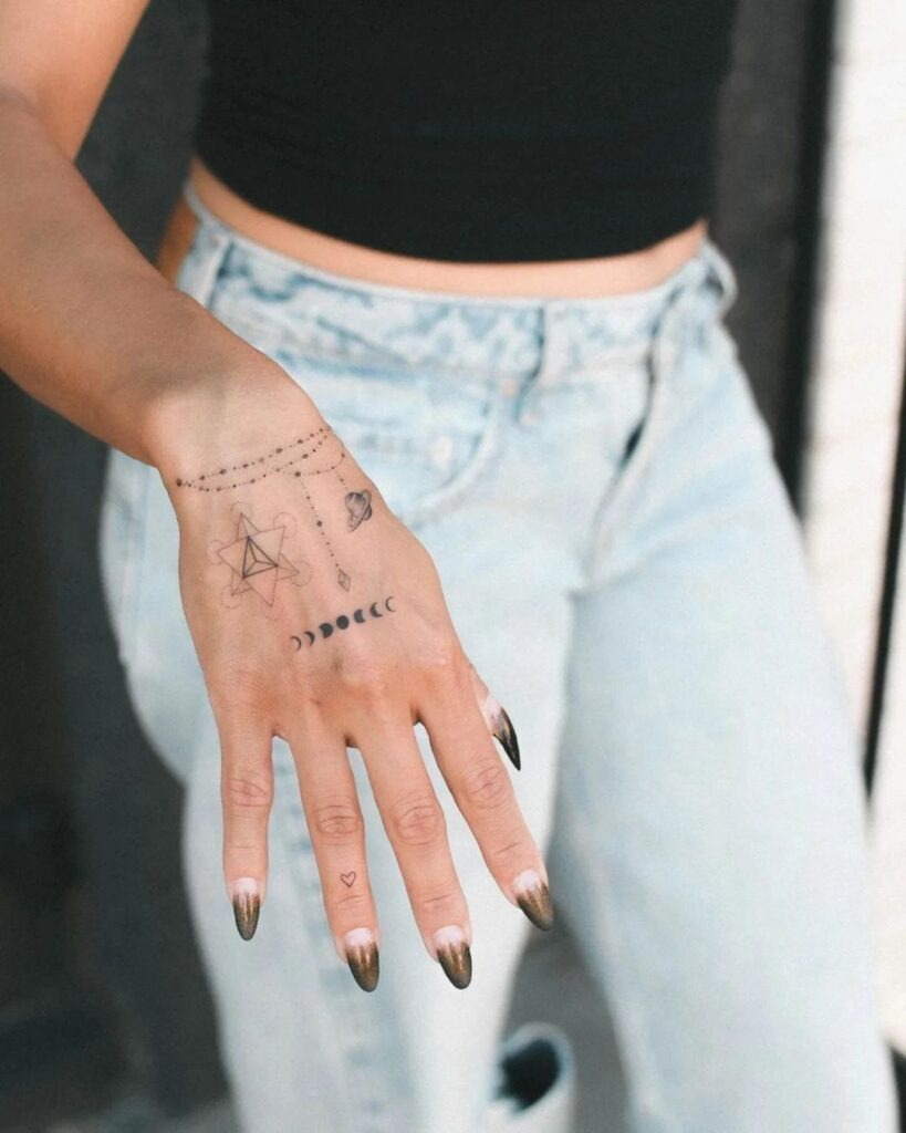 Geometric and Celestial Hand Tattoo Design Tattoo Design