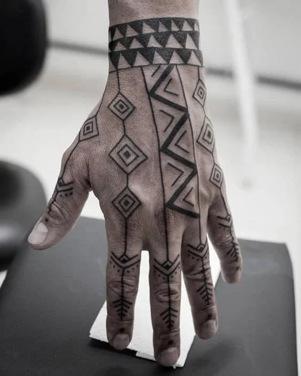 Geometric Hand Tattoo with Bold Patterns Tattoo Design