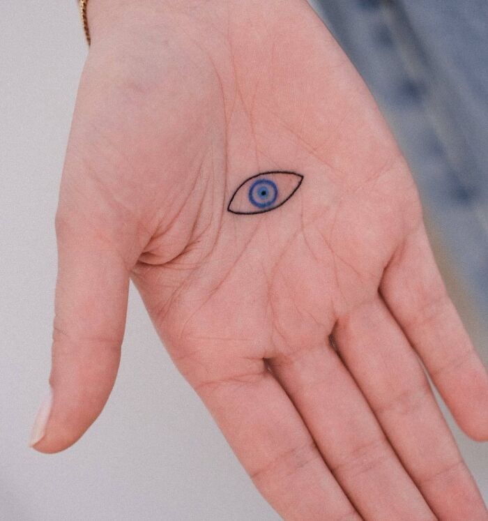 Minimalist Blue Eye Tattoo on the Palm Tattoo Design