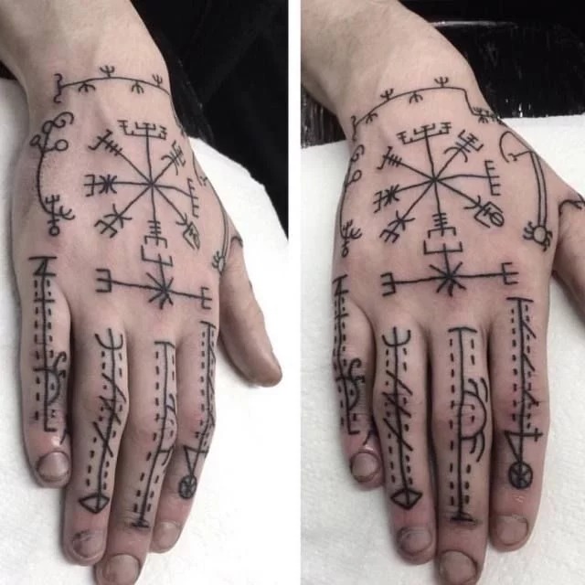 Nordic Symbol Hand Tattoo with Intricate Designs Tattoo Design