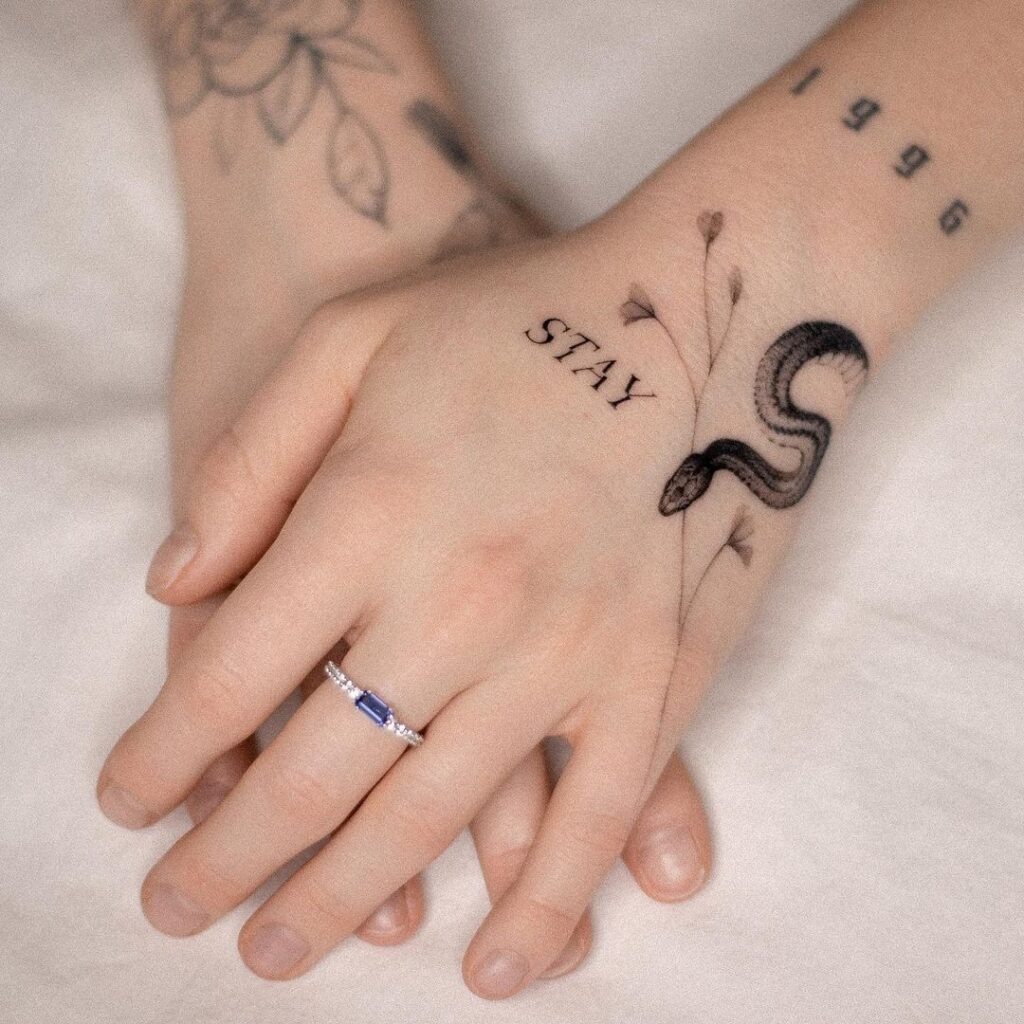 Stay and Snake Hand Tattoo Design Tattoo Design
