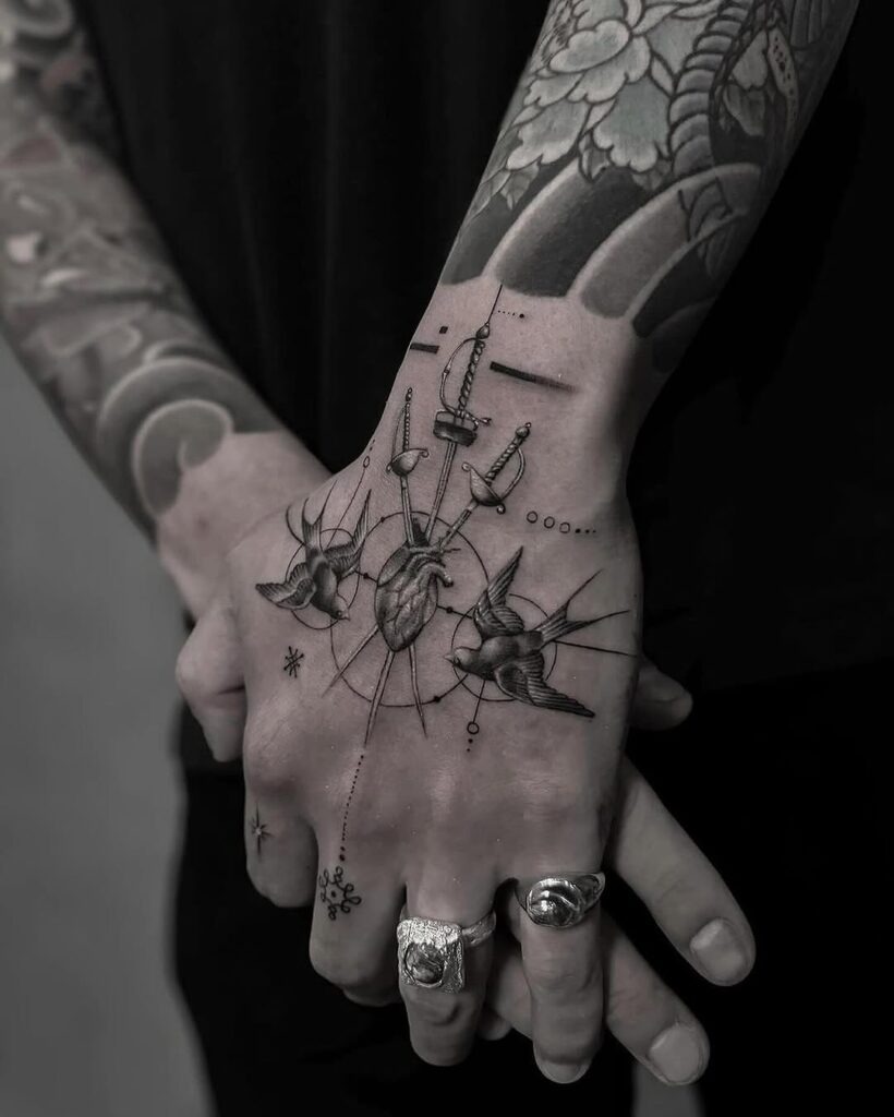 Swords, Hearts, and Doves Hand Tattoo Design Tattoo Design