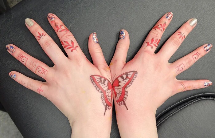 Vibrant Butterfly and Floral Hand Tattoo Design Tattoo Design