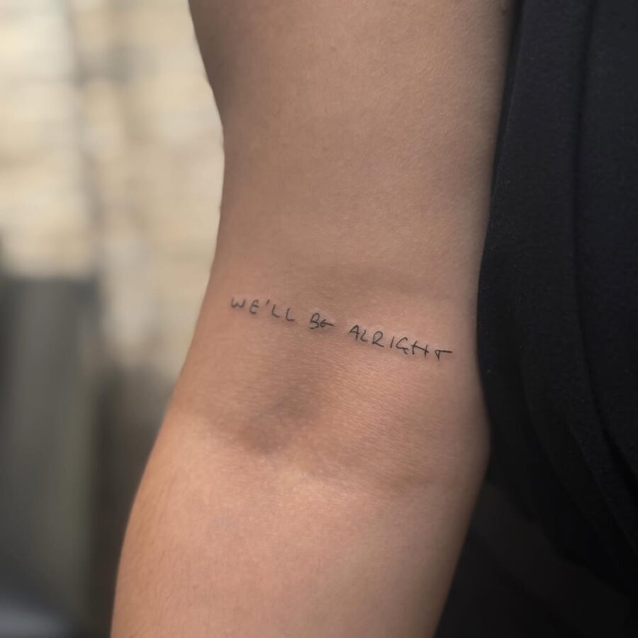 Delicate Script Reminds Us: We'll Be Alright Tattoo Design