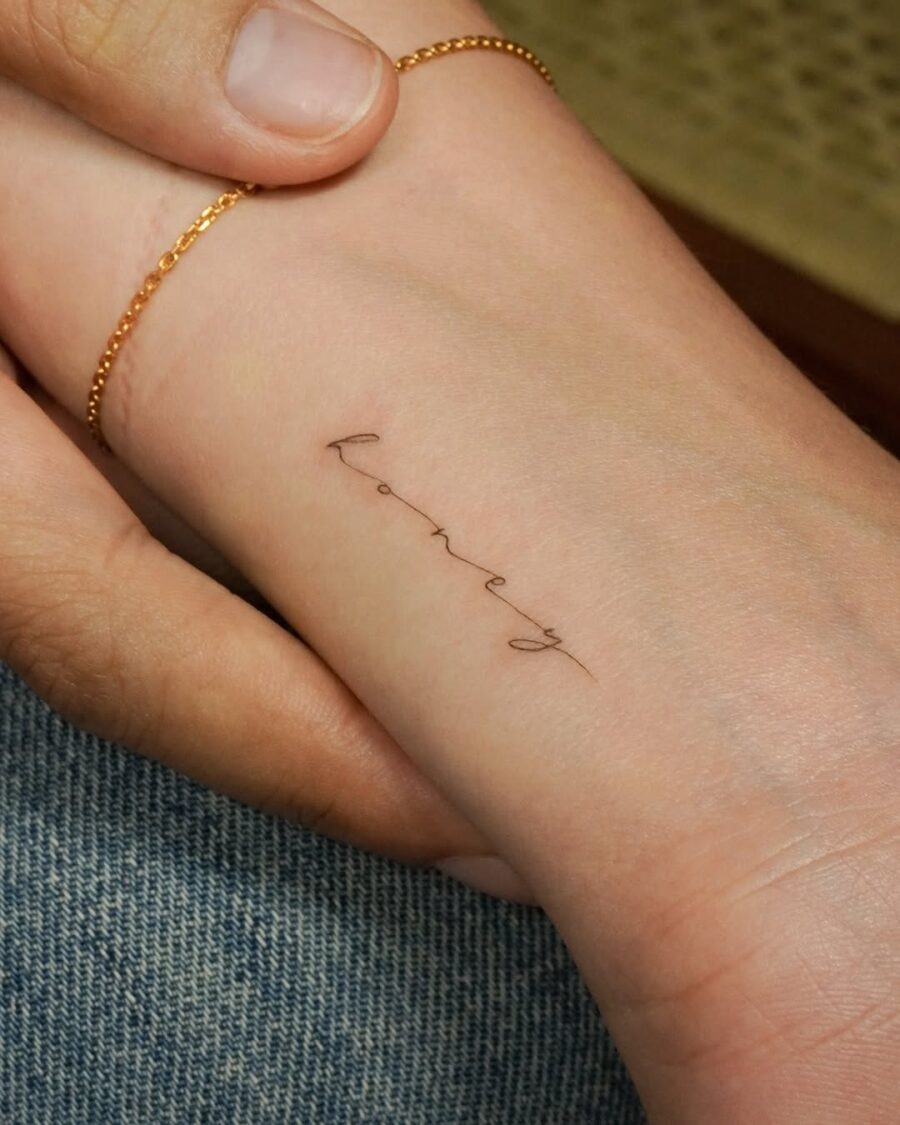 Elegant and Minimalist Handwriting Tattoo Tattoo Design