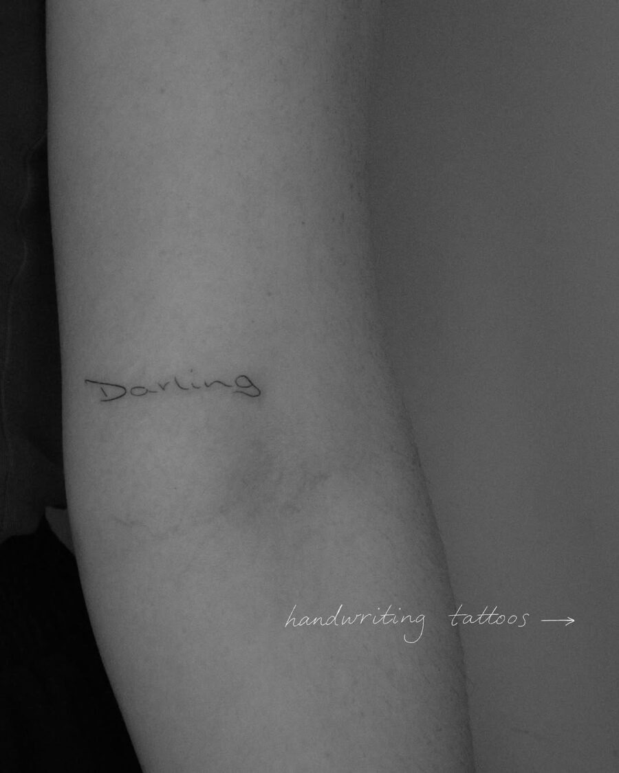 Elegant handwriting tattoo exuding warmth and love Tattoo Design