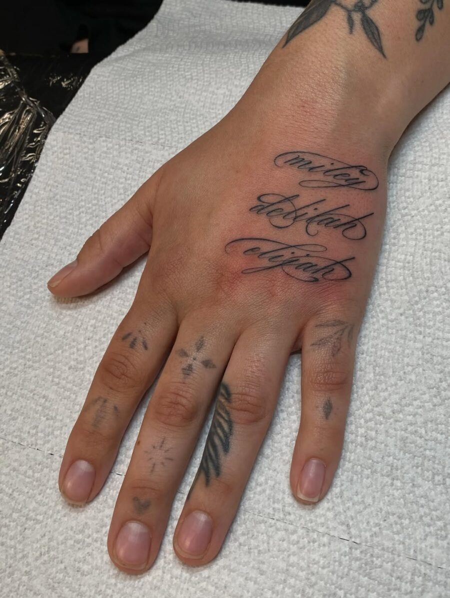 Elegant Handwriting Tattoo on the Hand Tattoo Design