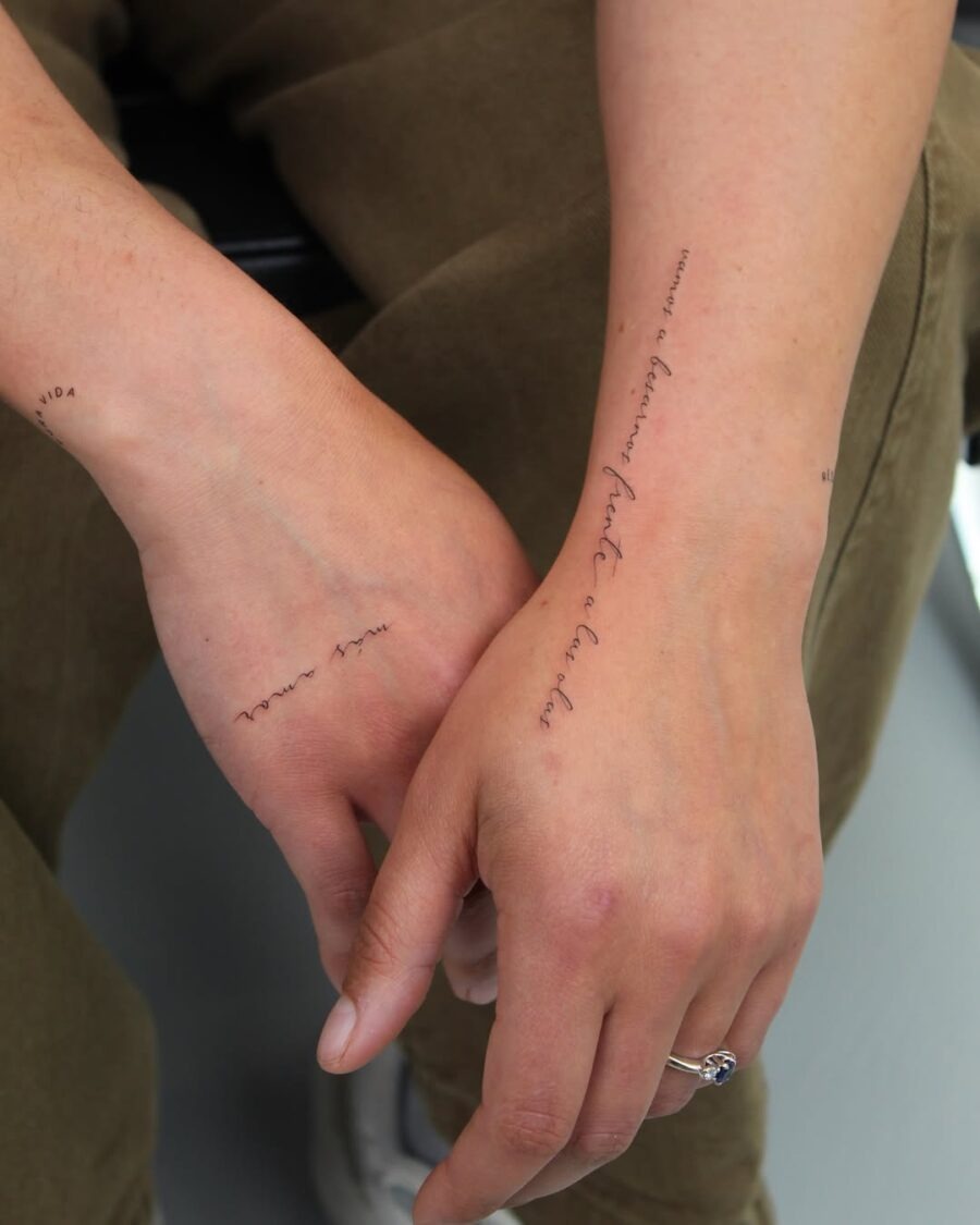 Elegant handwriting tattoos on well-defined arms. Tattoo Design