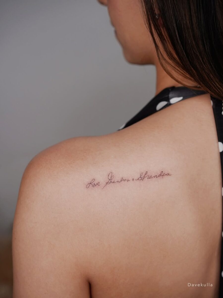 Elegant Script Tattoo: 'Live Free, Love Hard' Tattoo Design