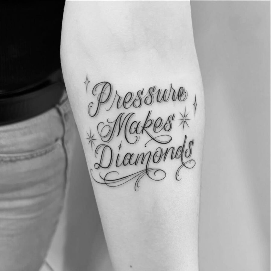 Elegant script tattoo with inspiring message Tattoo Design