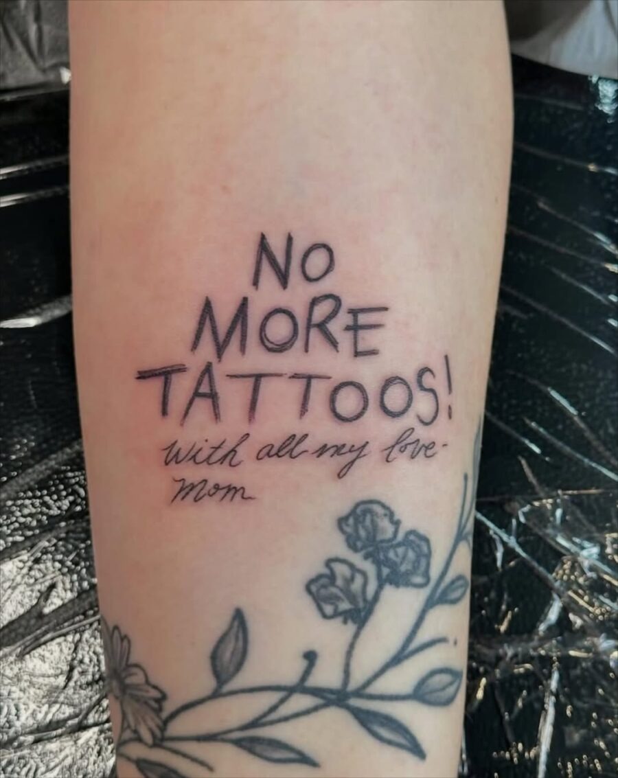 Stylish Handwritten Message with Floral Details Tattoo Design