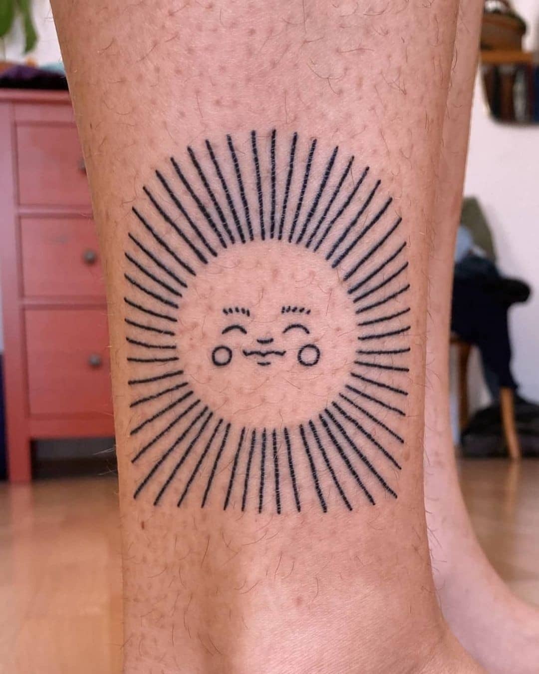 A bright and cheerful sun tattoo design Tattoo Design