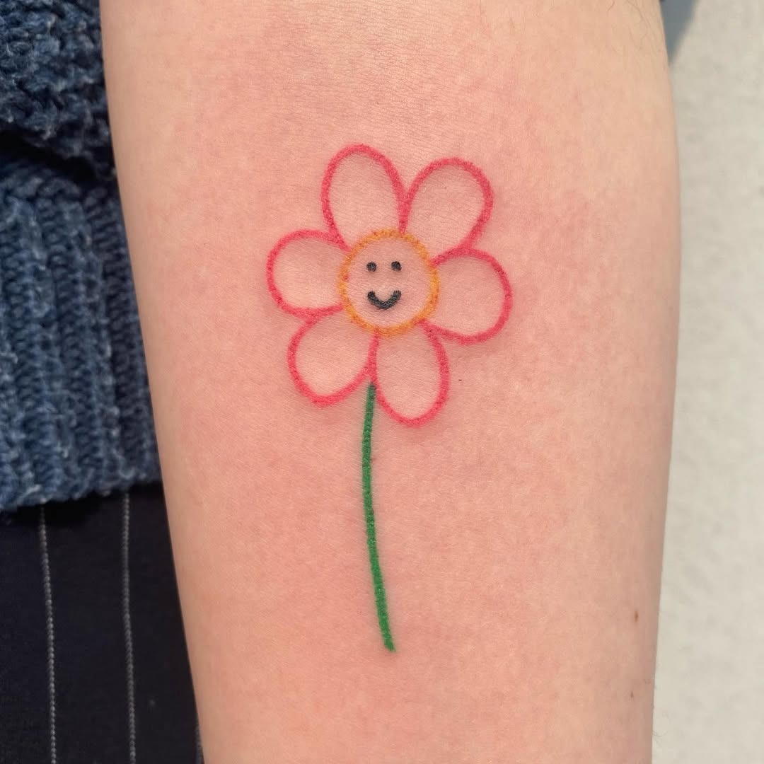 Charming smiley flower tattoo for positivity Tattoo Design