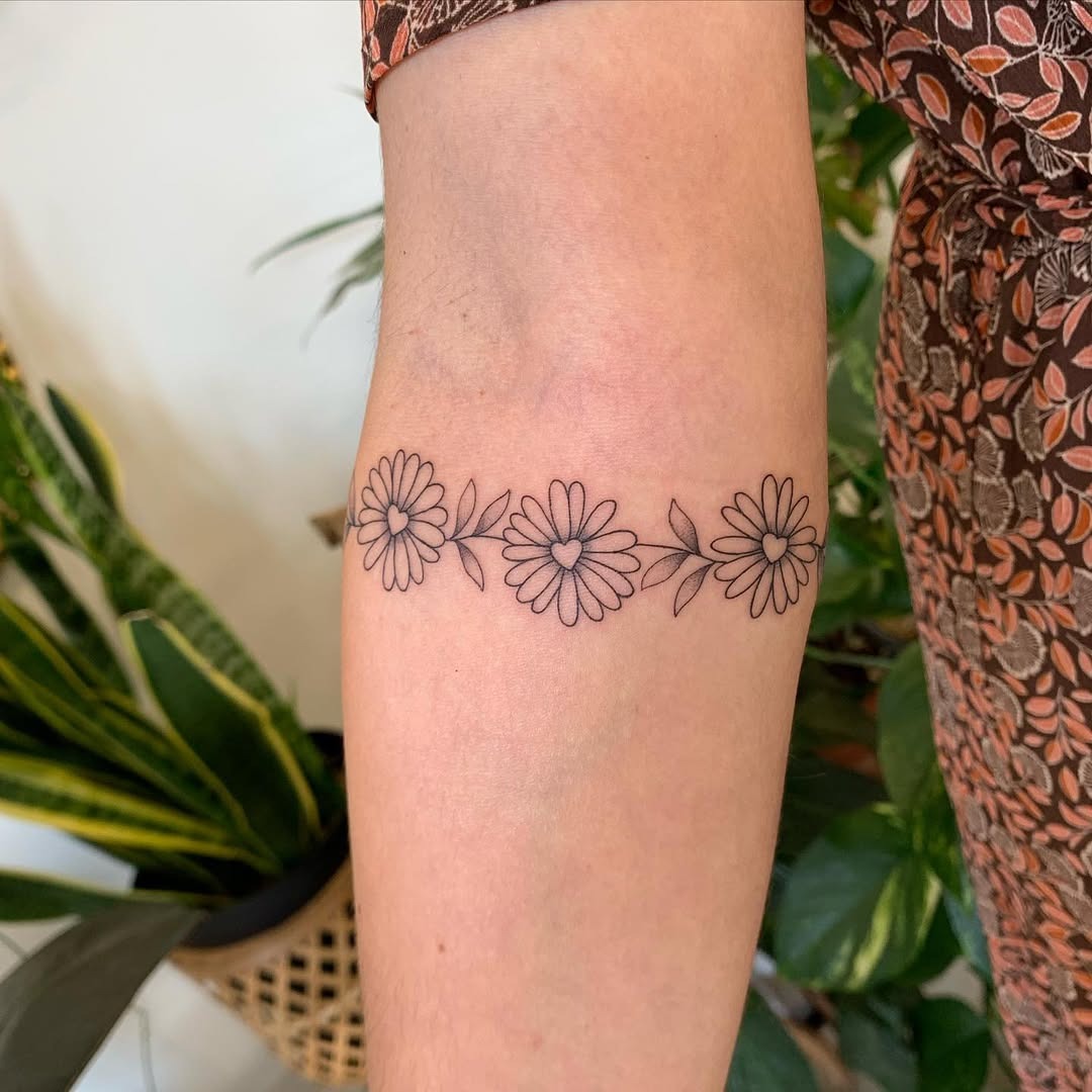 Delicate floral tattoo for a joyful vibe Tattoo Design