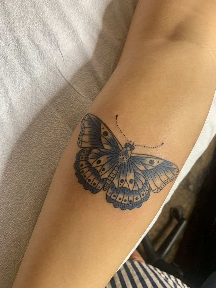 Blue Butterfly Harry Styles Tattoo, a tattoo design rendered in clean detailed linework for the arm.
