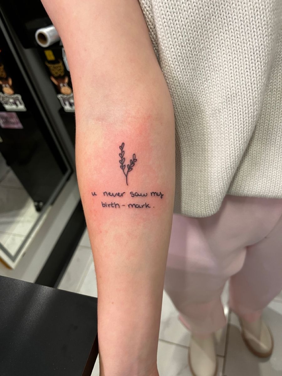 Delicate Birth-Mark Lyric Tattoo, a tattoo design rendered in clean detailed linework for the leg.