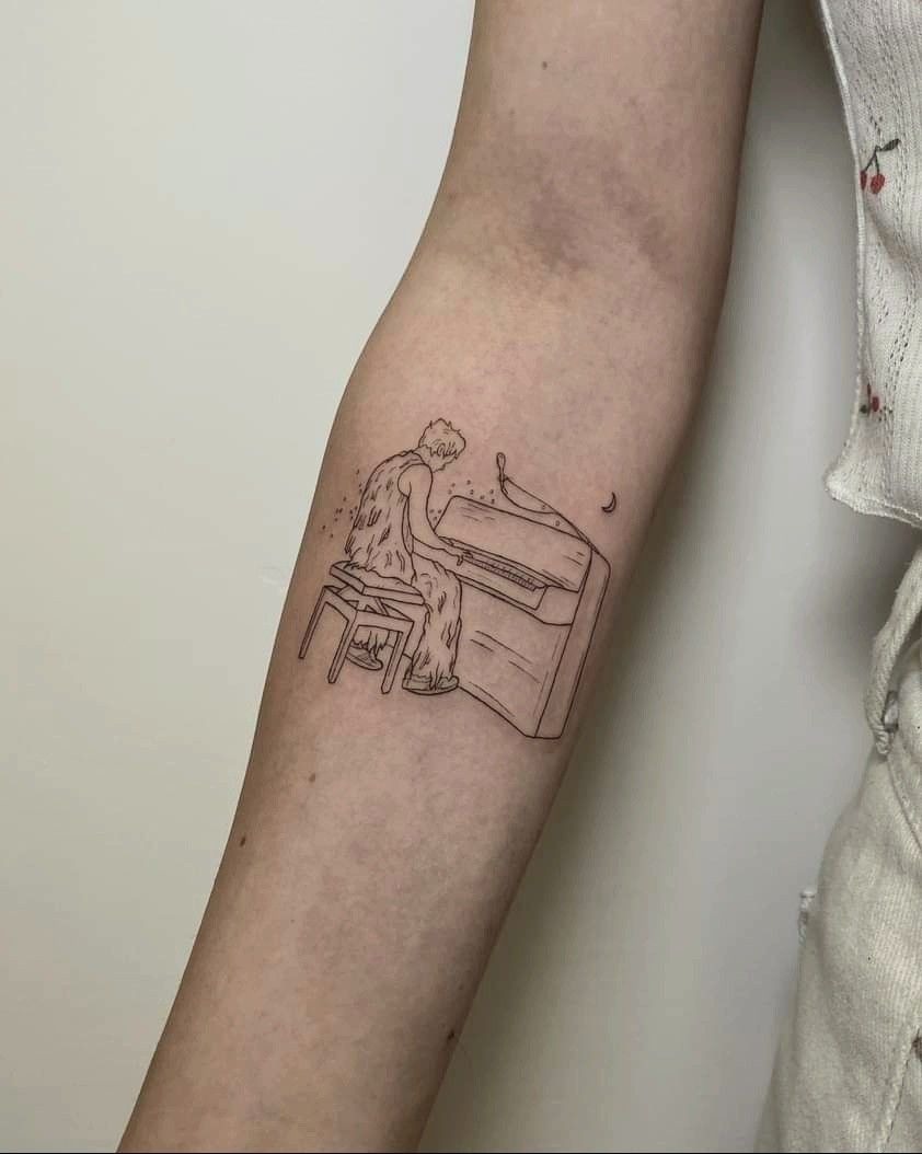 Falling Piano Scene Tattoo, a tattoo design rendered in clean detailed linework.