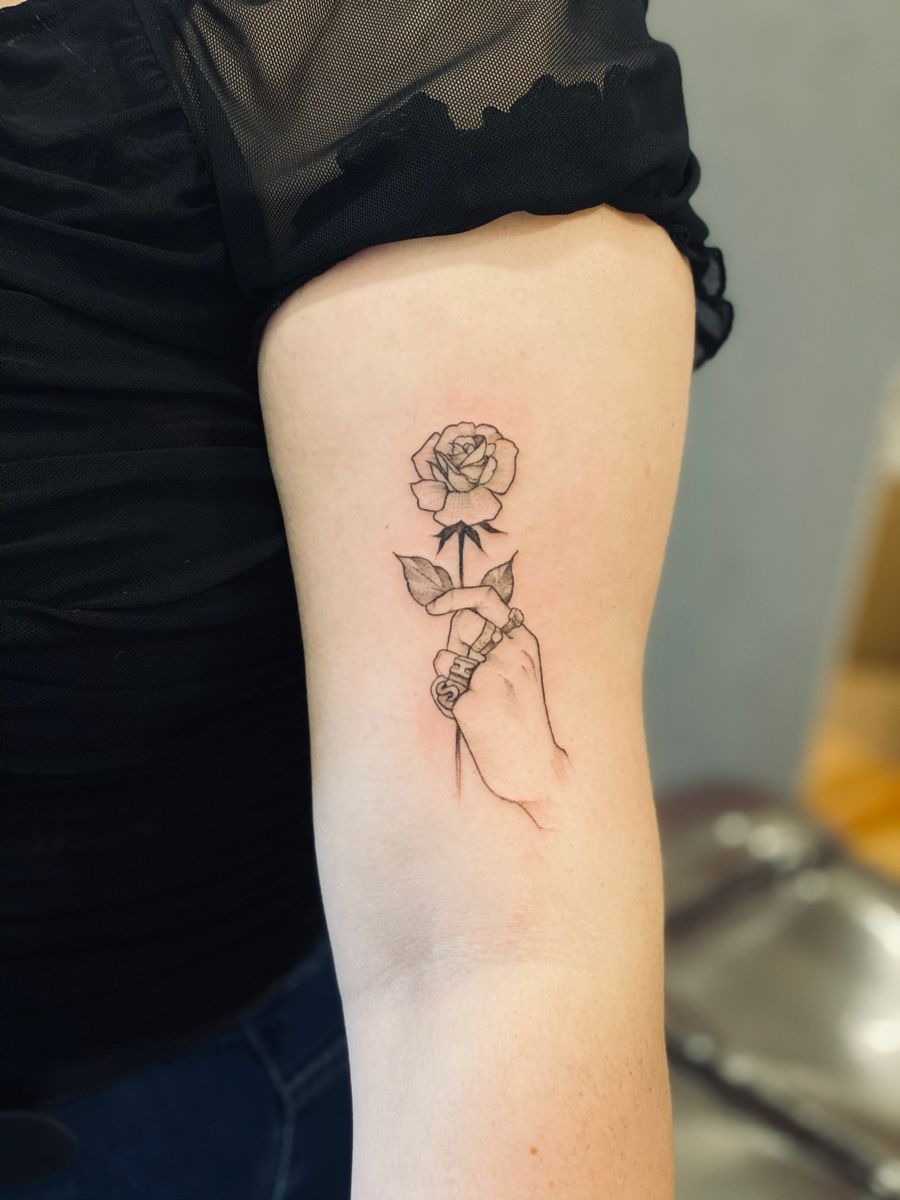 Rose and Key Hand Tattoo Design, a tattoo design rendered in clean detailed linework.