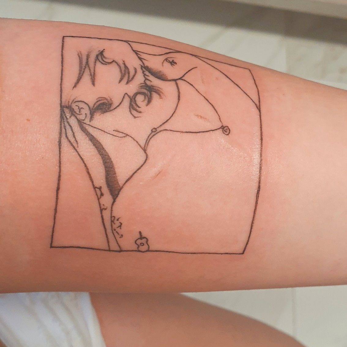 Soft Portrait Frame Inspired by Harry, a tattoo design rendered in clean detailed linework for the arm.