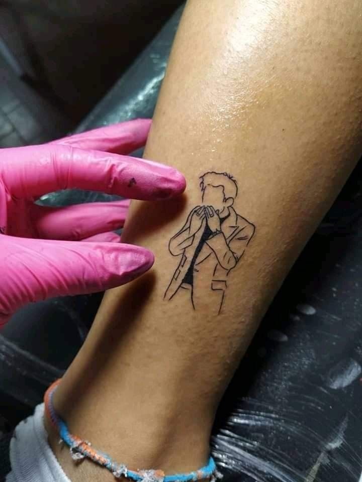Tiny Singer Silhouette in Fine Line Style, a tattoo design rendered in clean detailed linework for the leg.