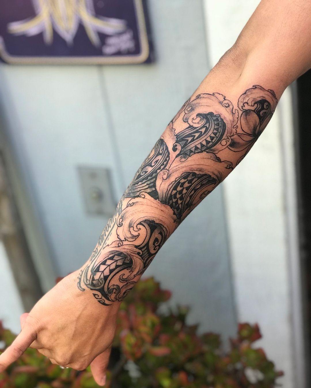 Polynesian Dolphin and Plumeria Forearm Tattoo Tattoo Design