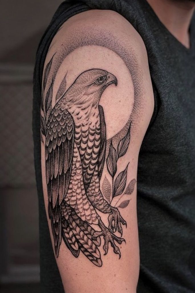 Sun-Symbol Hawk Across the Upper Back Tattoo Design