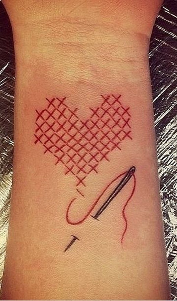 Cross Stitch Heart for Sewing Enthusiasts Tattoo Design