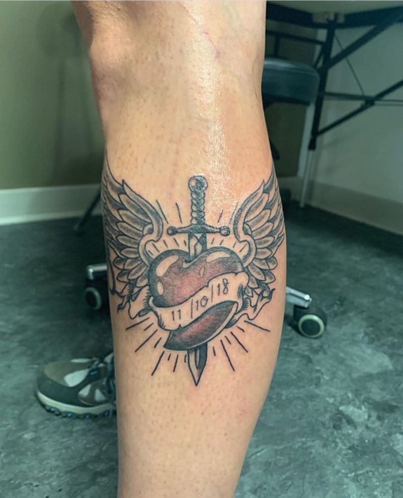 Winged Heart with Memorable Date to Commemorate a Special Day Tattoo Design