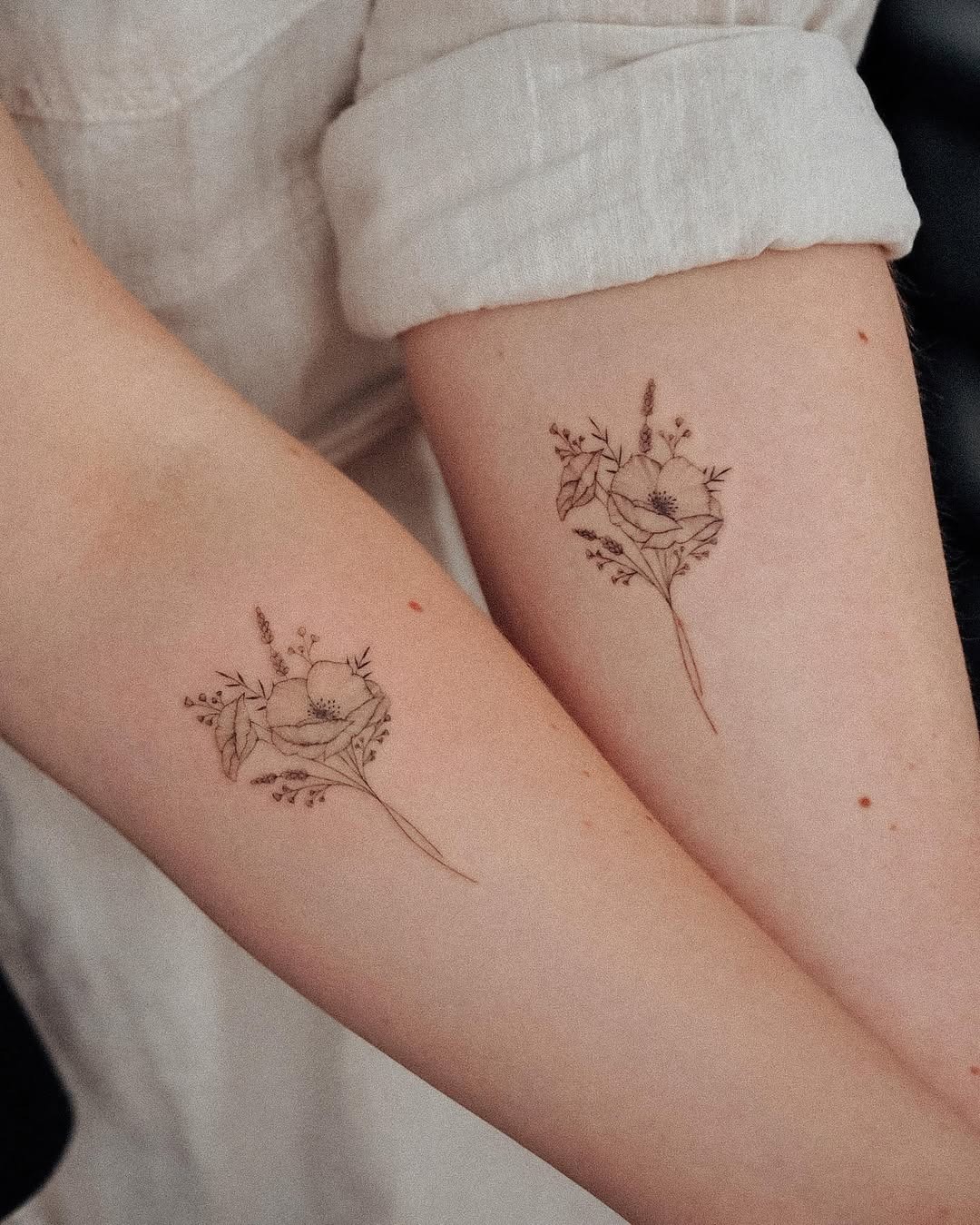 Delicate floral designs for sisterhood celebration Tattoo Design