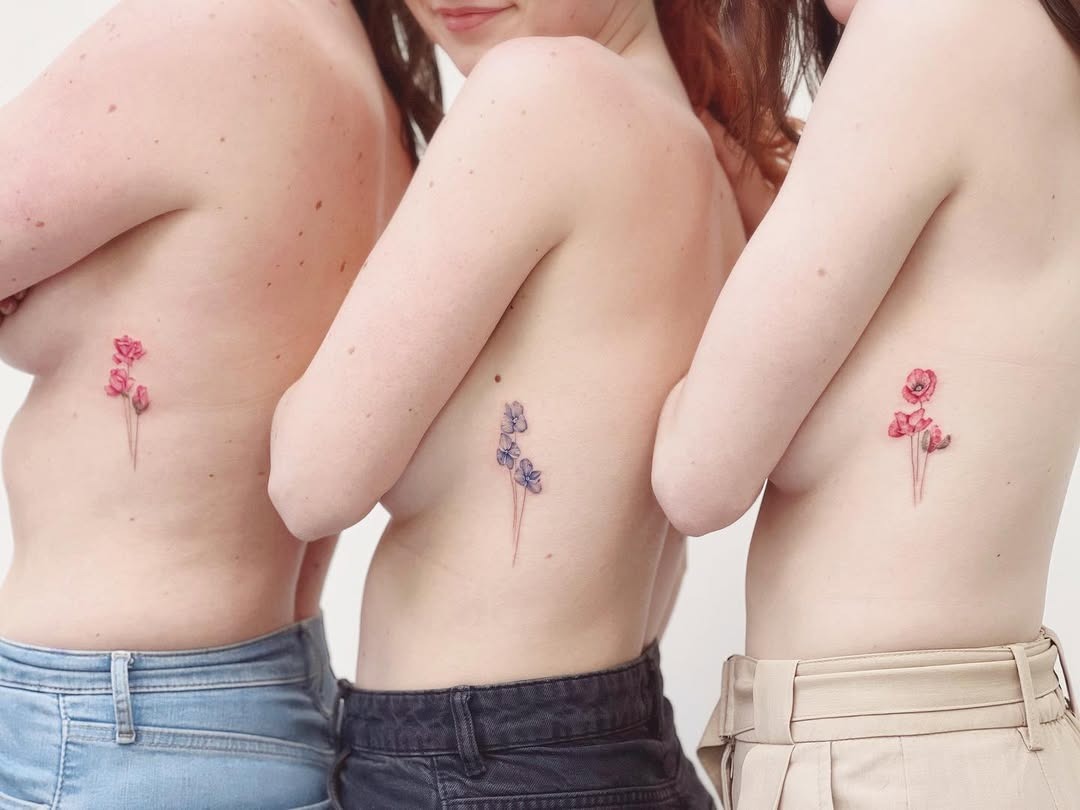 Delicate symbols representing sisterly love Tattoo Design