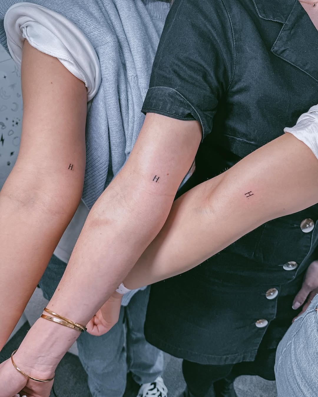 Elegant hand tattoos symbolizing sisterly connection Tattoo Design
