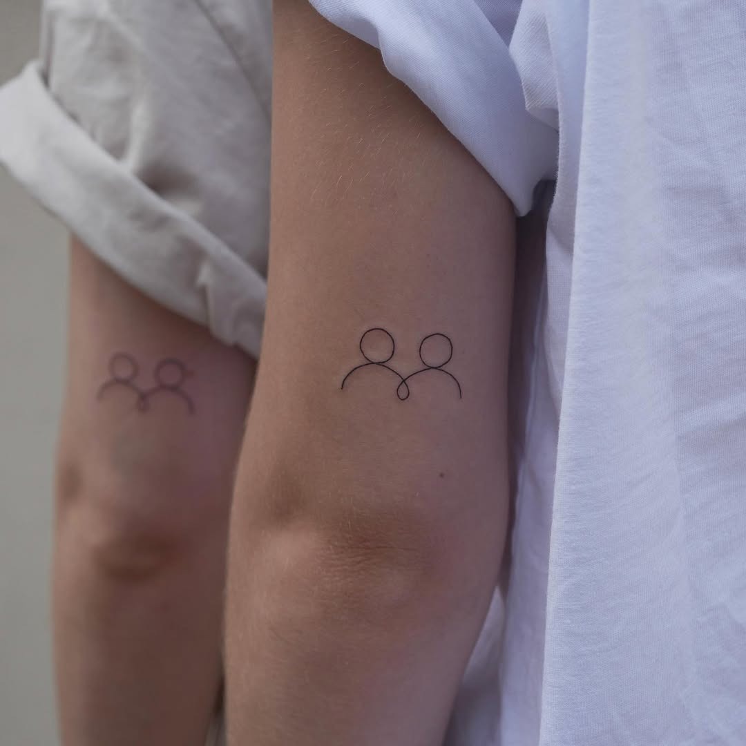 Elegant minimalistic line tattoos for sisters Tattoo Design