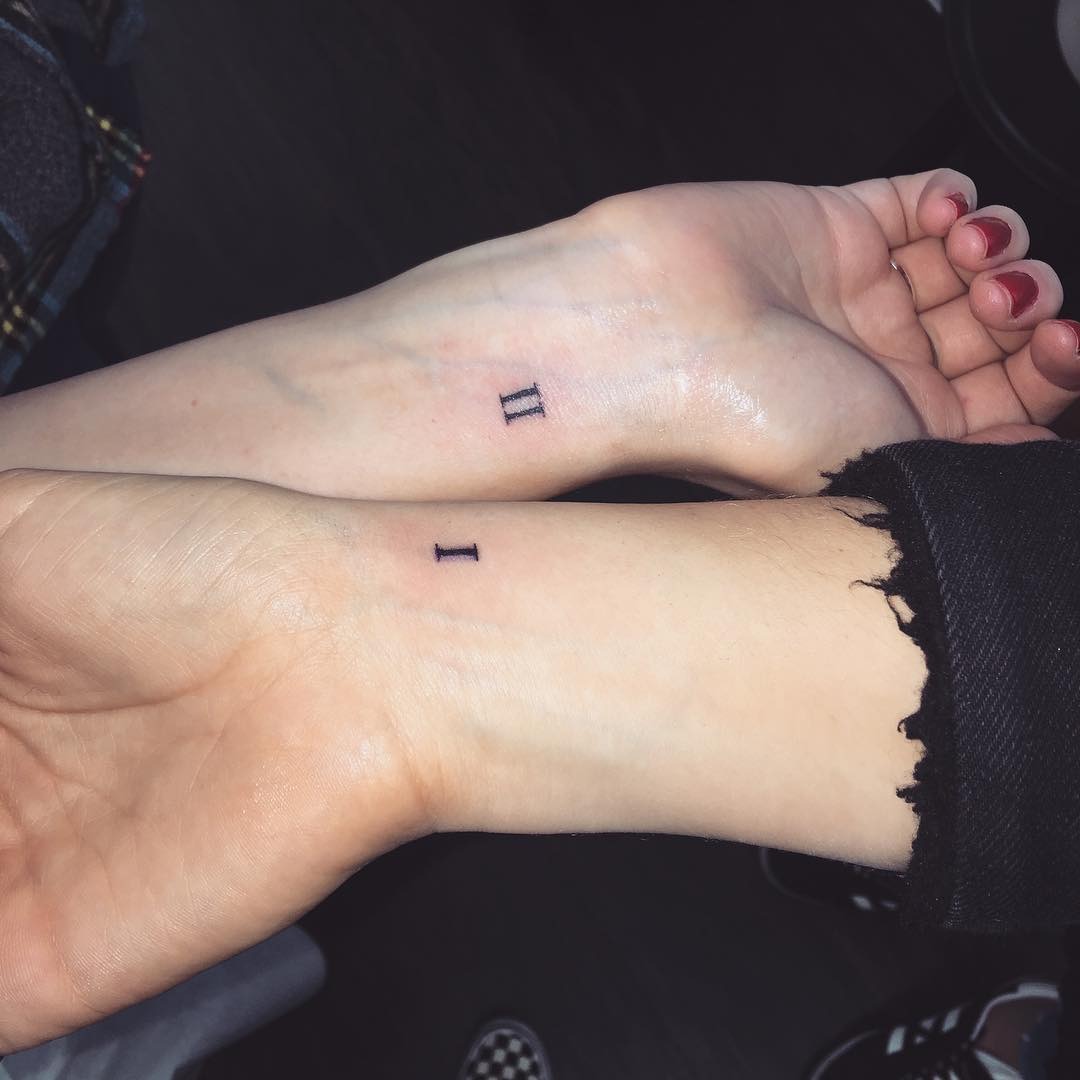 Elegant sister tattoos featuring rose designs Tattoo Design